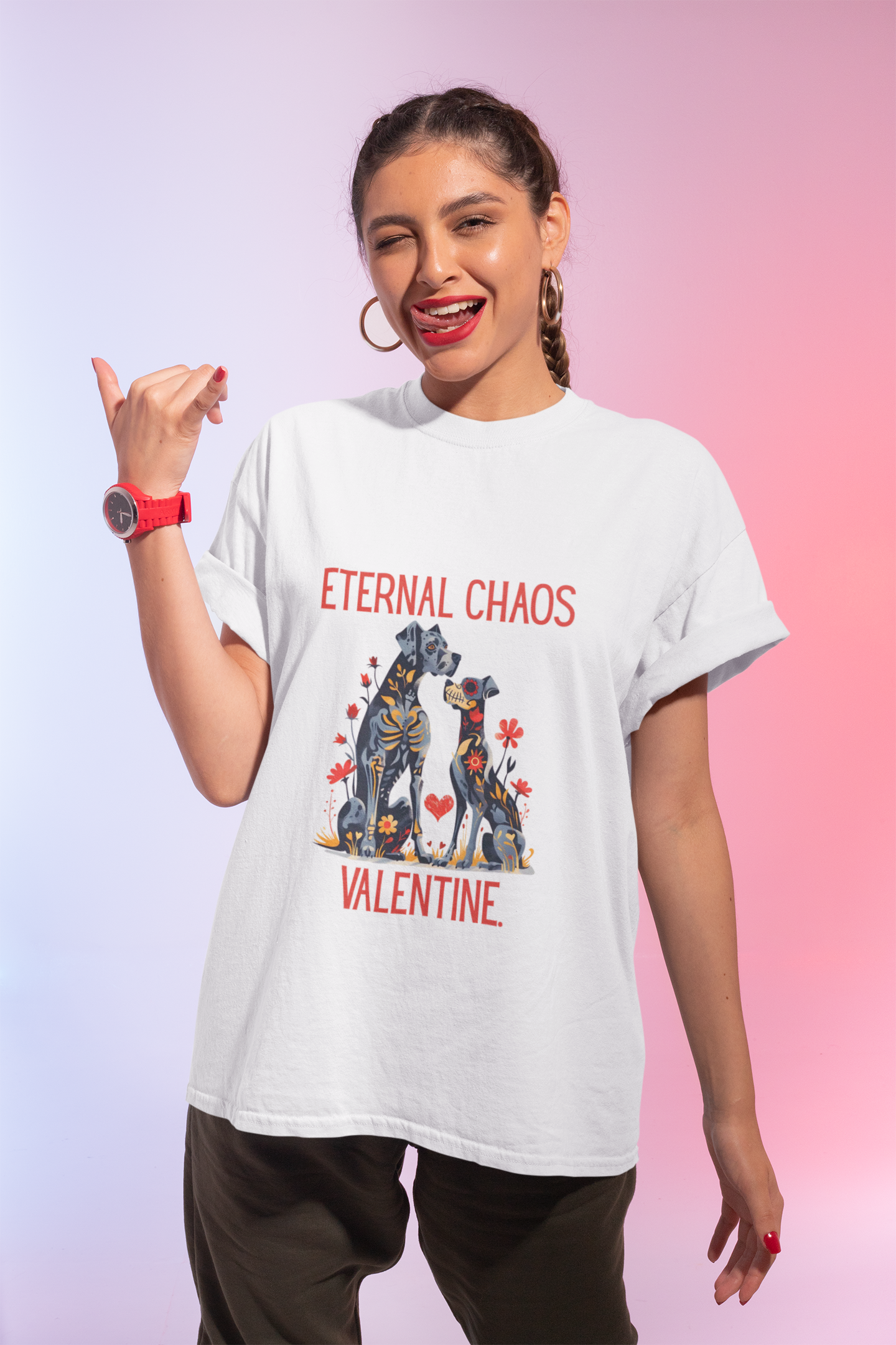 Woman wearing a white t-shirt with two stylized dogs, floral artwork, and text reading Eternal Chaos Valentine