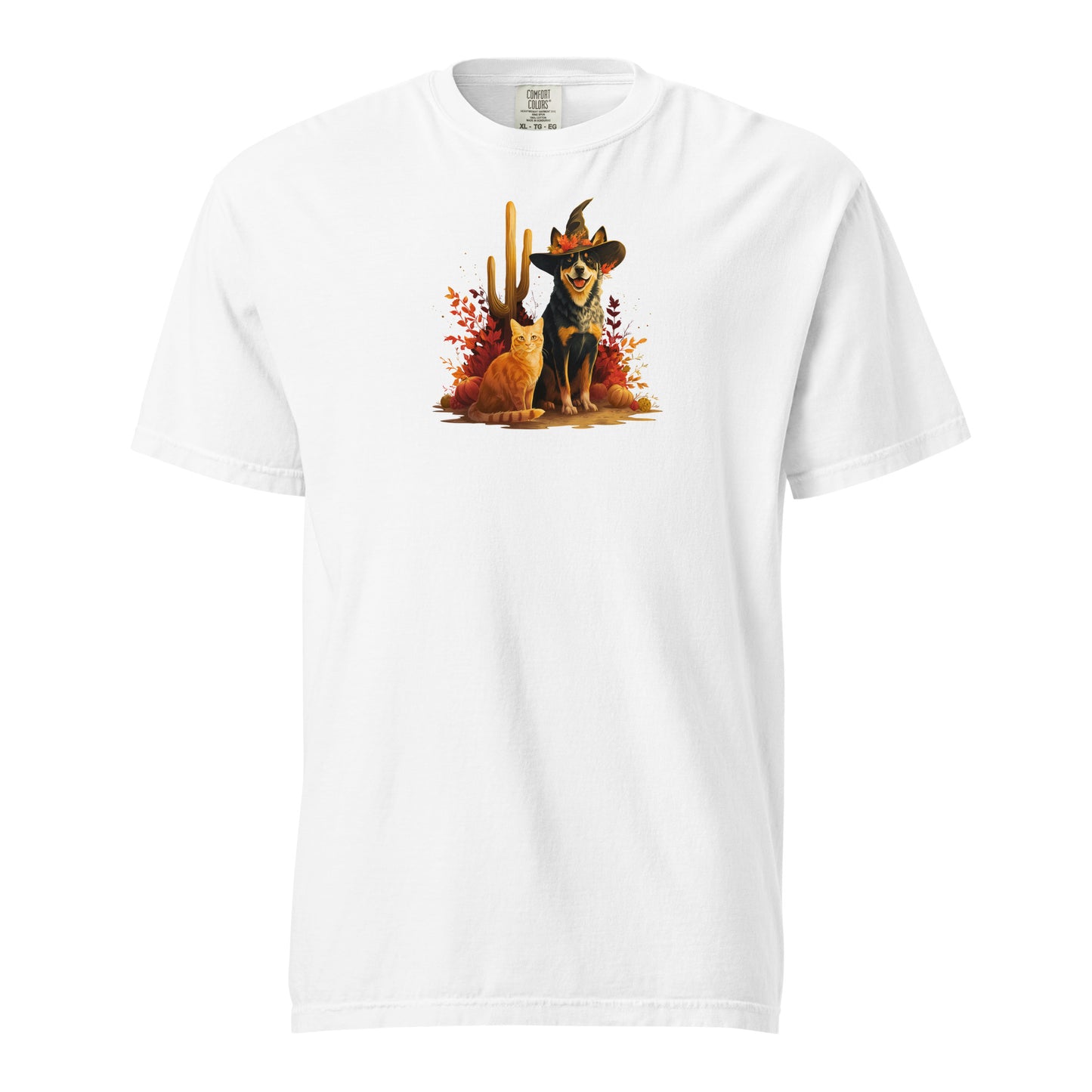 White t-shirt with colorful graphic of a orange cat and heeler in a witch hat desert autumn leaves and cacti.