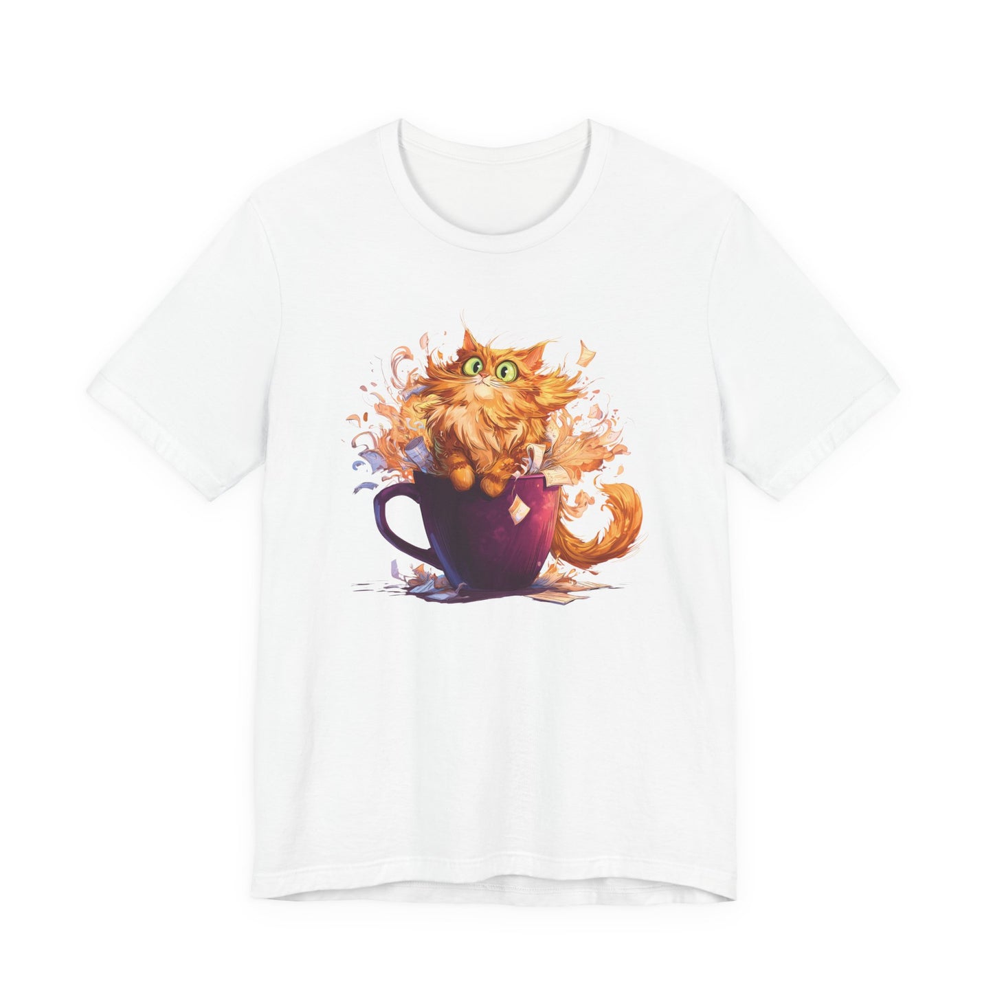 A white short-sleeve crewneck t-shirt featuring a colorful graphic print of an orange tabby cat sitting inside a dark purple coffee mug with paint splatters.