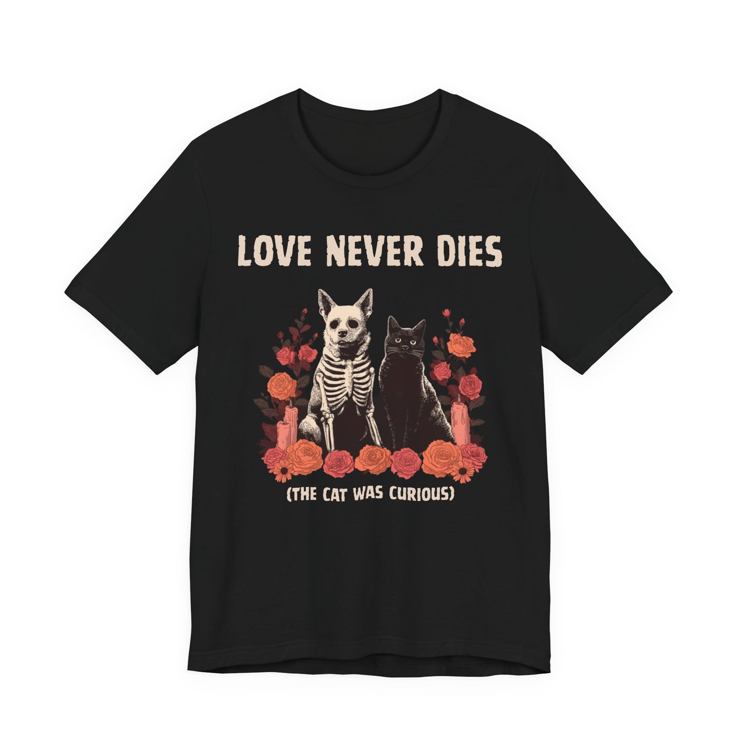Black t-shirt with a graphic of a dog and cat skeleton and roses, with text 'Love Never Dies (The Cat Was Curious)' on a white background.