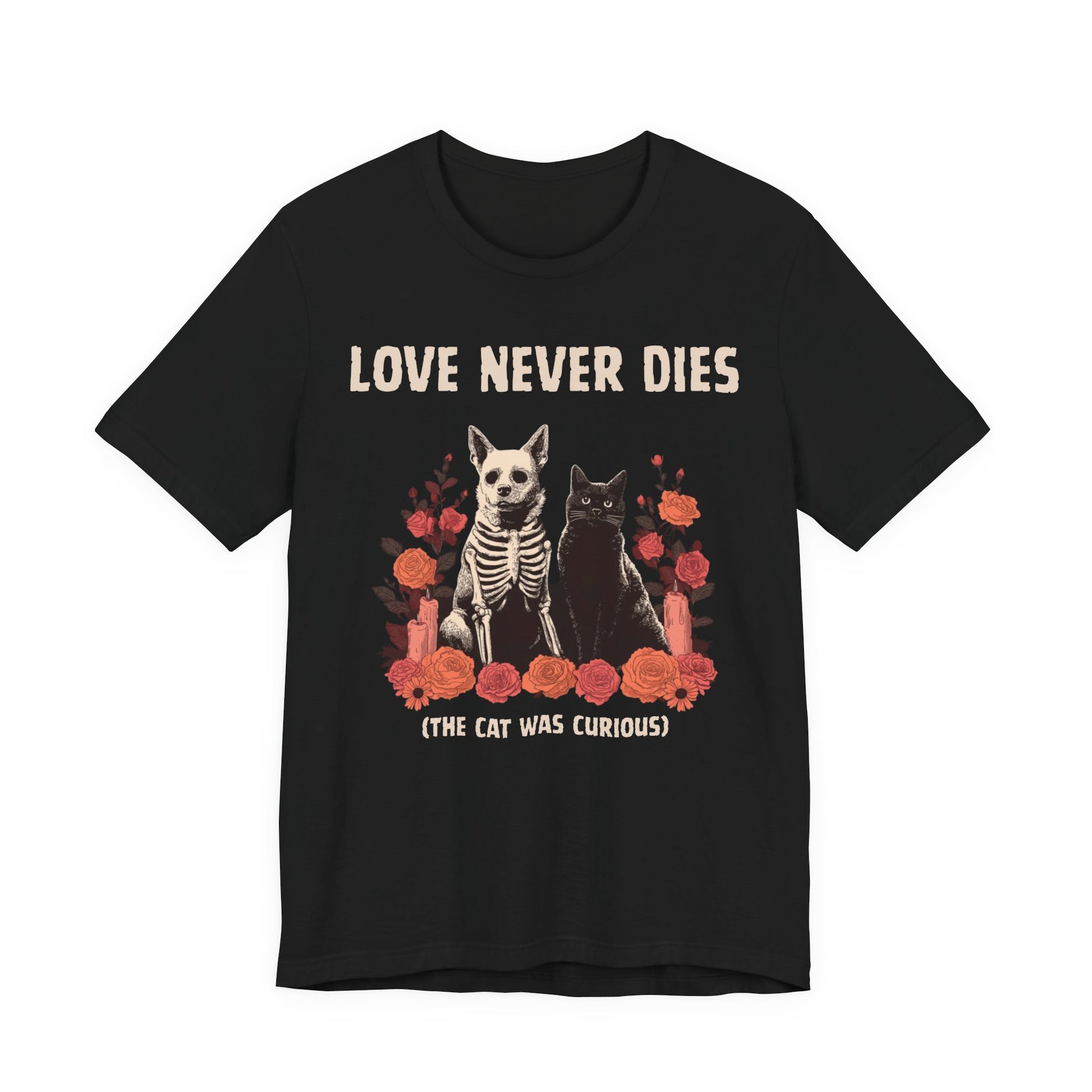 Black t-shirt with a graphic of a dog and cat skeleton and roses, with text 'Love Never Dies (The Cat Was Curious)' on a white background.