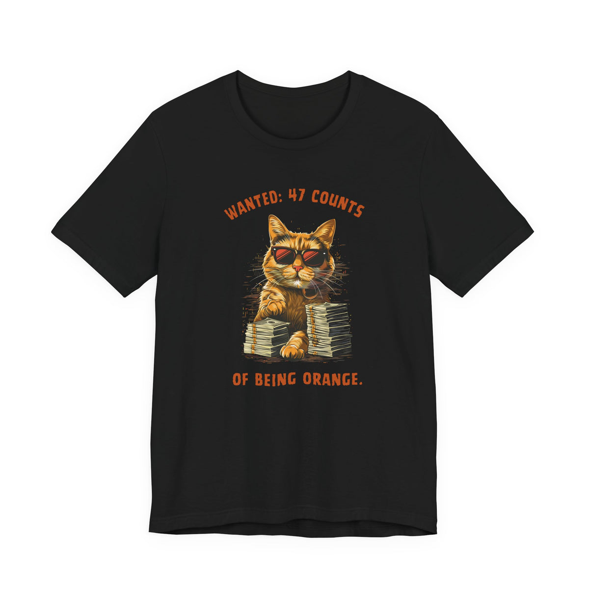 Front view of a black t-shirt displaying a cat graphic with the text 'Wanted: 47 Counts of Being Orange.'