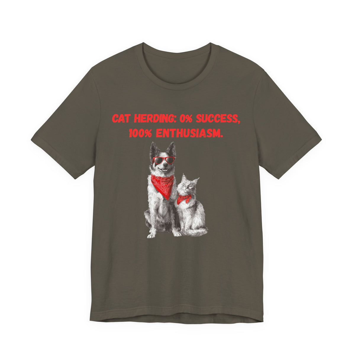 Olive green t-shirt displaying a dog and cat design with humorous text about cat herding, text reads 'Cat Herding: 0% Success, 100% Enthusiasm.'