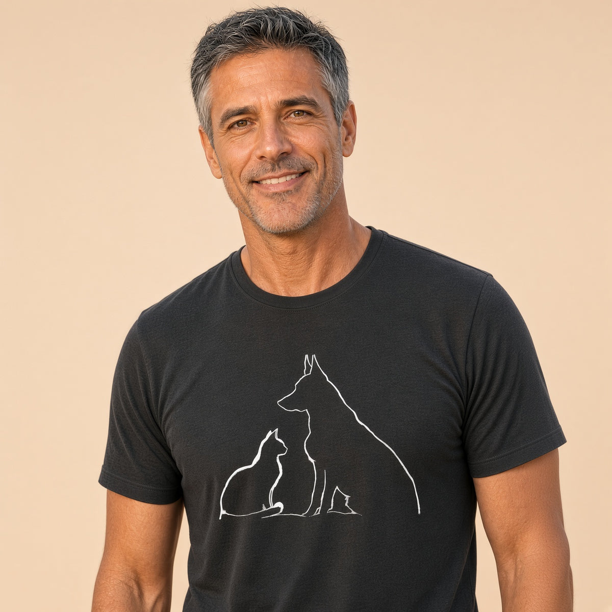 Man wearing a black t-shirt featuring a minimalist silhouette of a dog and cat.