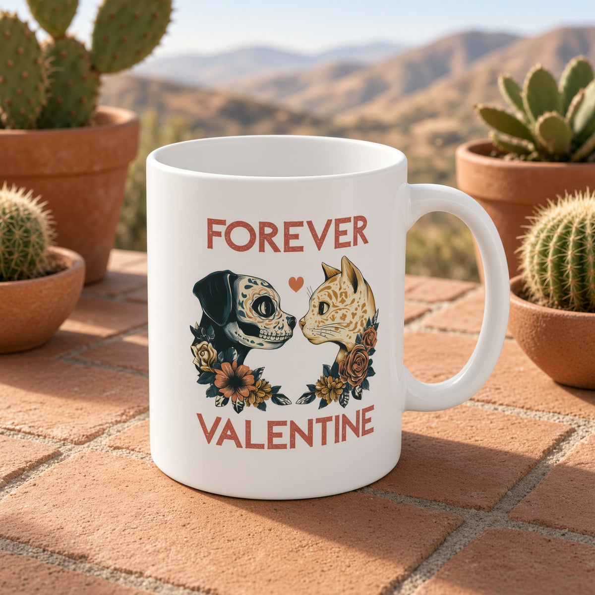 White mug with Day of the Dead dog and cat design, surrounded by cacti.