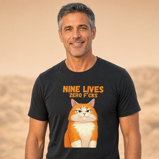 Man wearing a black t-shirt with an orange cat graphic and with the text 'NINE LIVES ZERO F*CKS'.