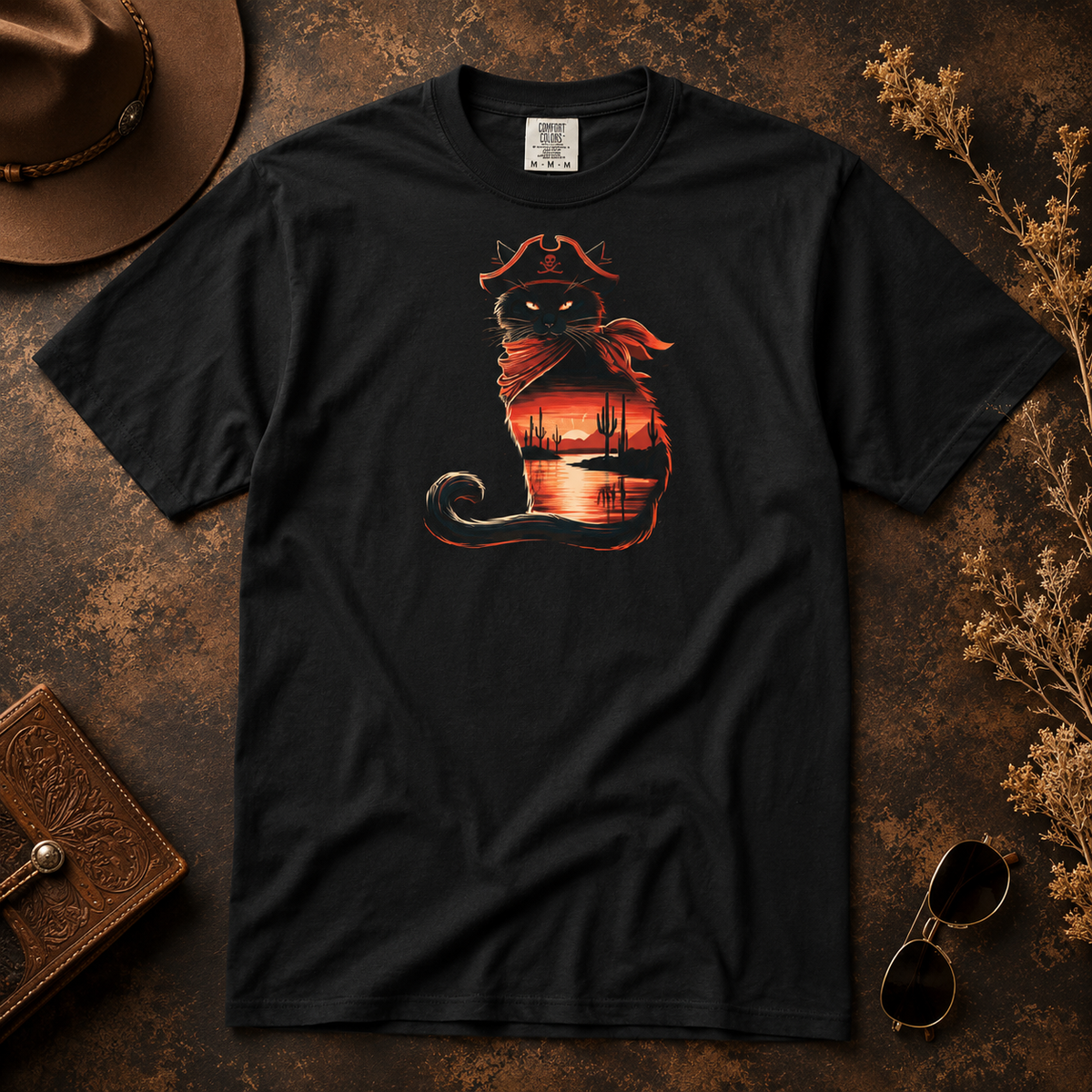 Black t-shirt displaying a pirate cat graphic against a textured background.