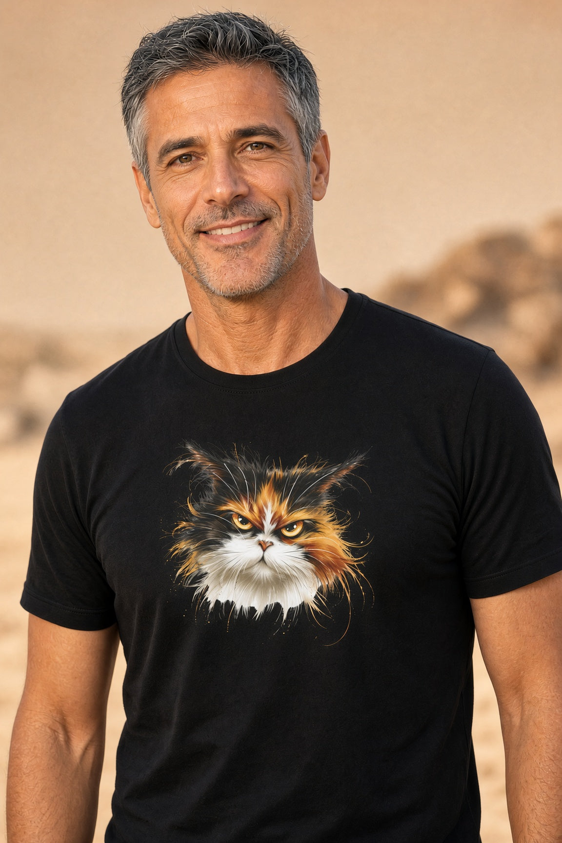Man wearing a black t-shirt featuring a fierce calico cat graphic.