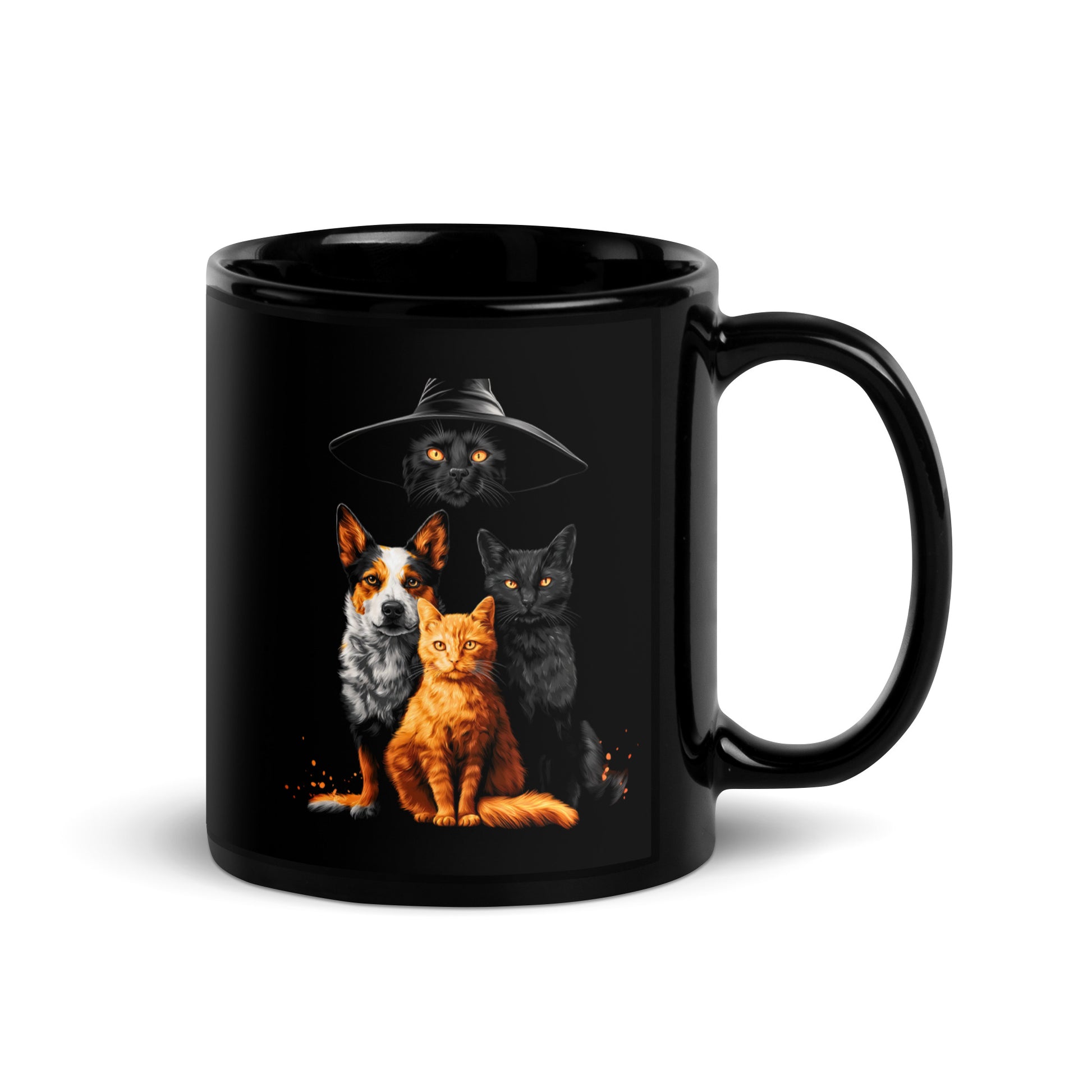 Black mug with a graphic of a black cat in a witch hat with a cattle dog, a black cat  and a orange cat.