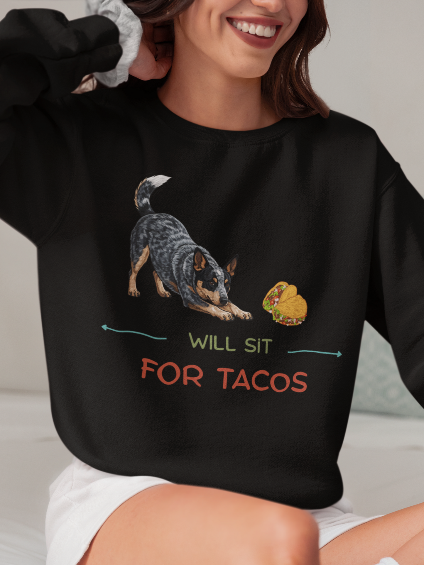 Black sweatshirt with Blue Heeler dog bowing toward tacos and text reading Will Sit for Tacos