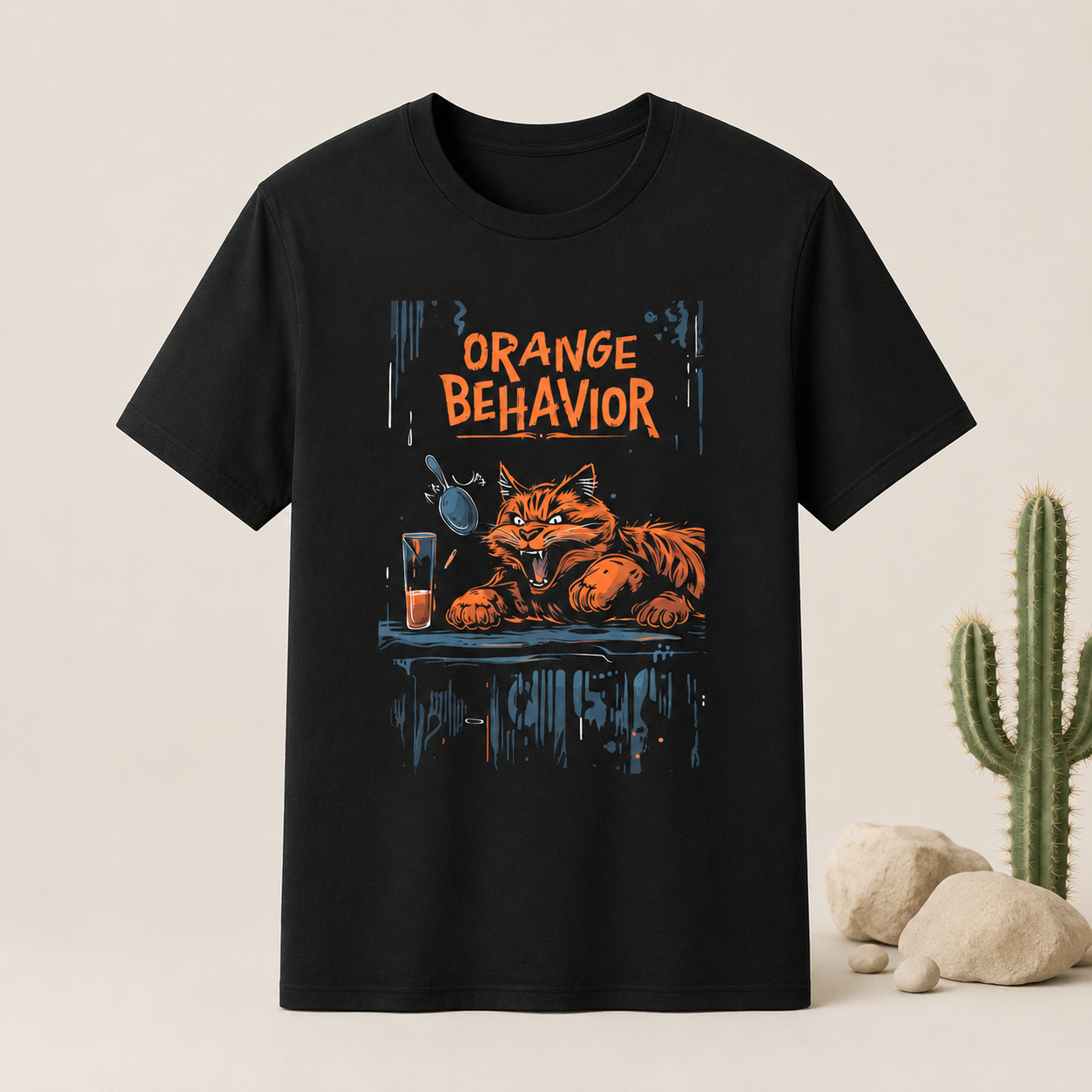 Black t-shirt with 'Orange Behavior' graphic design featuring a bear and glass on a beige background.
