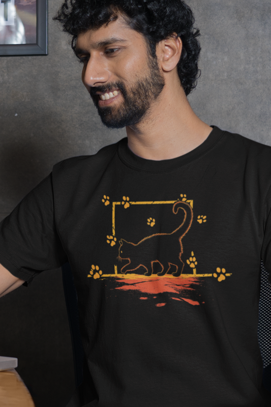 Man wearing a black t-shirt with a graphic design of a lion and paw prints.