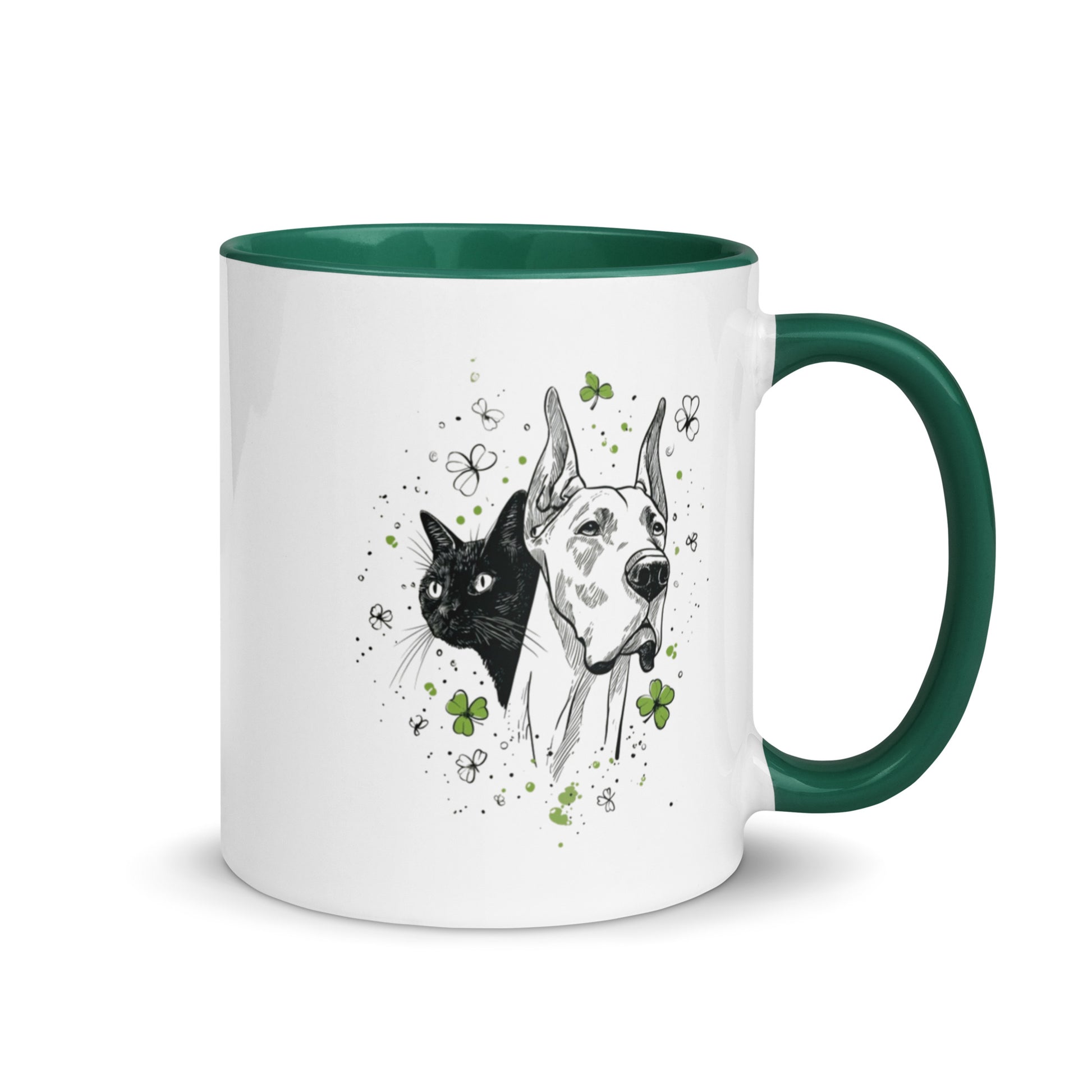 White mug with dark green handle and interior featuring ink sketch Great Dane and black cat with shamrocks.