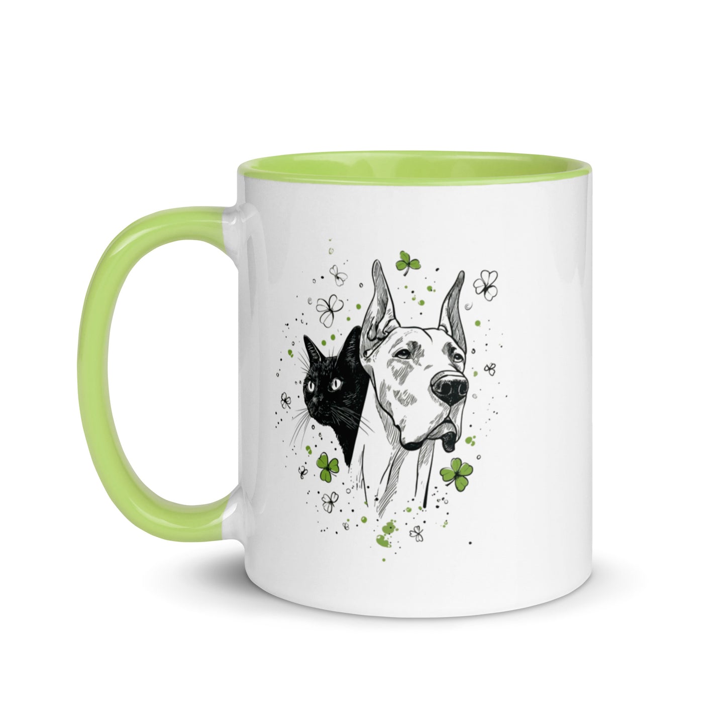White mug with light green handle and interior featuring ink sketch Great Dane and black cat with shamrocks.