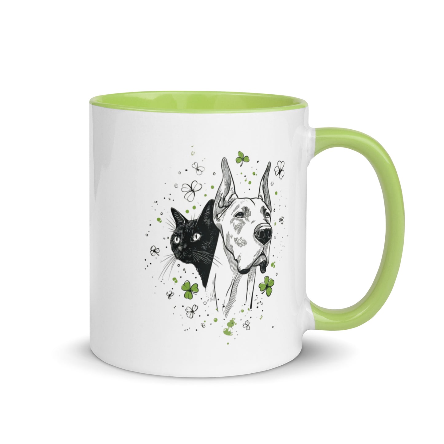 White mug with light green handle and interior featuring ink sketch Great Dane and black cat with shamrocks.